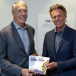 Gerry Price with Rob Wozny holding copies of I'm Just Gerry - Like an Ant on a Blueberry Pie.